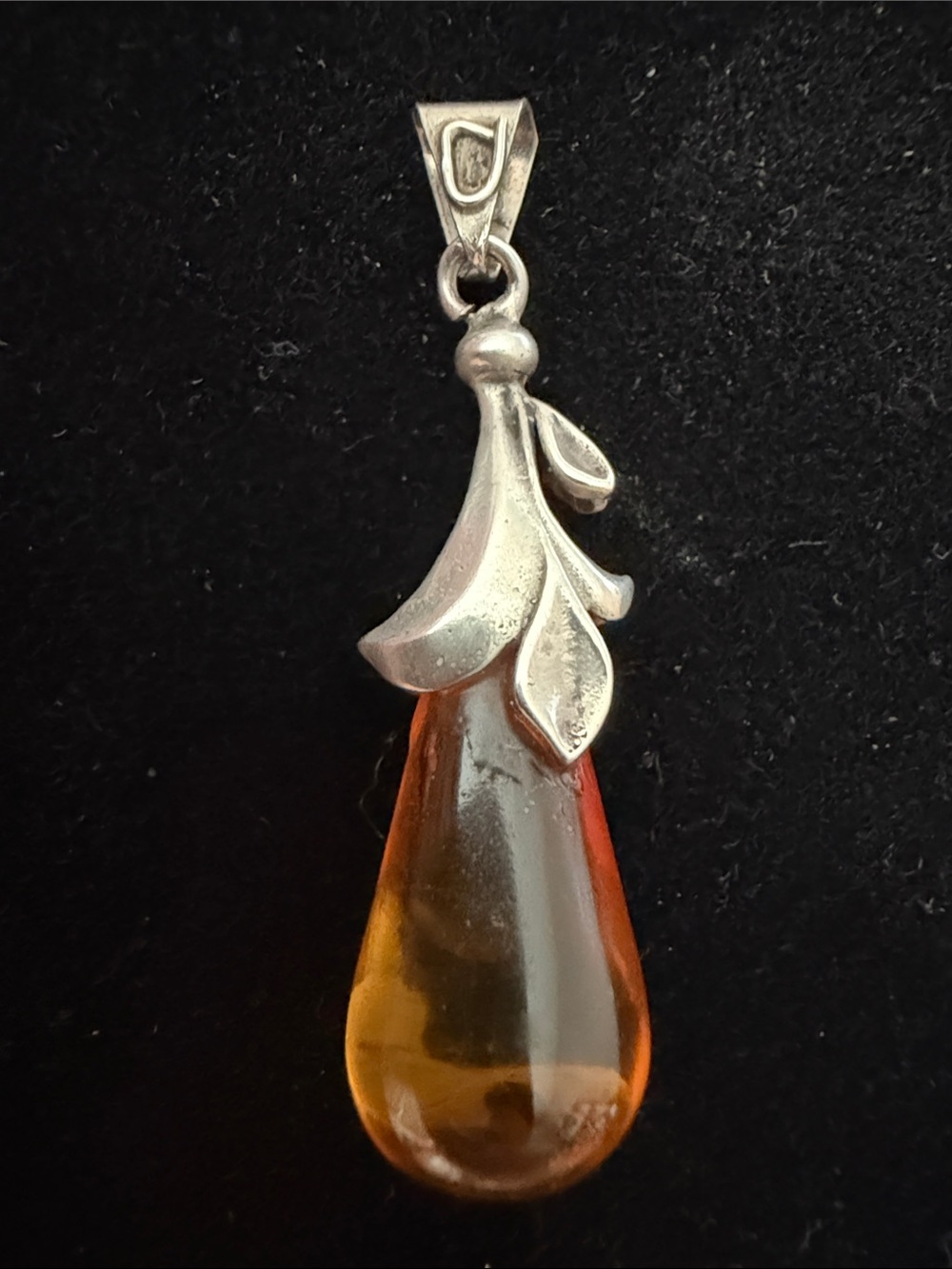 Vintage 925 sterling silver artisan teardrop pendant with natural Baltic Amber